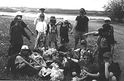 Second grade students from the Dr. Arthur Hines Elementary School in Summerville, Nova Scotia, round up rubbish they collected from brooks near a local beach.