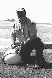 Bob Bowman, of the Center for Coastal Studies, developed a custom buoy system in which a satelletie tracking mechanism is enclosed in the shaft of a heavy duty buoy that can be attached to fishing gear on an entangled whale. The device enables a disentanglement team to track and relocate the animal if they are unable to release it from the gear on the first attempt.