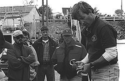 At a workshop for fishermen in North Head, Grand Manan, New Brunswick, Ed Lyman (right) of the Center for Coastal Studies demonstrates tools used to cut fishing gear off of entangled whales.
