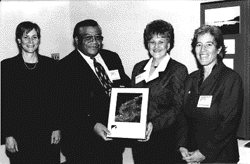 Image - At their semi-annual Council meeting, members recognize 1997's Visionary Award winners. From left are Council Members Trudy Coxe, Secretary, Massachusetts Executive Office of Environmental Affairs; Wayne Adams, Minister, Nova Scotia Department of Environment; Irene d'Entremont. MIT Electronics, Inc.; and Peg Brady, Director, Massachusetts Coastal Zone Management Office.