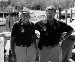 IMAGE: Charlie Swain (right) took over the family boat yard 20 years ago so his father Albert "Pete" Swain (left) could retire. The younger Swain has since become known for his "green" boatyard and his passion for educating others about environmentally responsible boating and business practices.