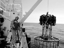 IMAGE: During a July, 1998 research cruise in the Gulf of Maine, Dave Townsend of the University of Maine and Ted Loder (hidden from view) of the University of New Hampshire prepare to lower an electronic data acquisition package off the RV Cape Hatteras, owned by the National Science Foundation.