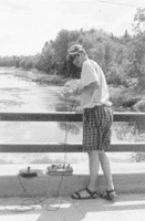 David Joseph, Water Resource Manager for the Houlton Band of Maliseets, tests Meduxnekeag River water samples for dissolved oxygen and temperature.