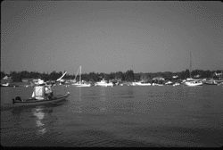 Image - Kayakers who paddle safely and courteously through fishing harbors, such as this one along coastal Maine, will avoid accidents, and are less likely to present problems to those working on the water.